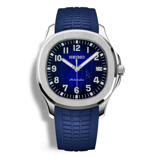 Montre Seiko Mod Aquanaut Bleu équipée du mouvement automatique Seiko NH35, avec un cadran noir texturé à motif quadrillé et un bracelet en caoutchouc bleu, pour une allure sobre, technique et contemporaine.