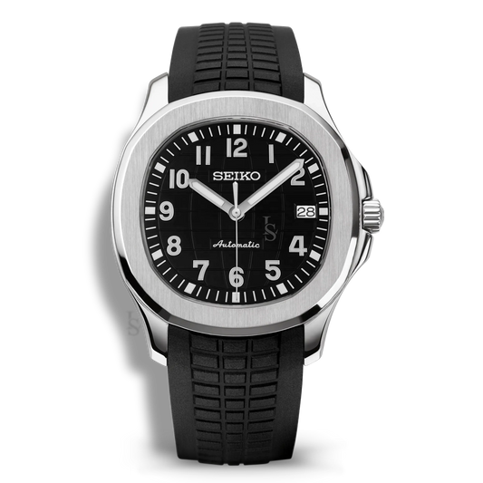 Montre Seiko Mod Aquanaut Noir équipée du mouvement automatique Seiko NH35, avec un cadran noir texturé à motif quadrillé et un bracelet en caoutchouc noir, pour une allure sobre, technique et contemporaine.